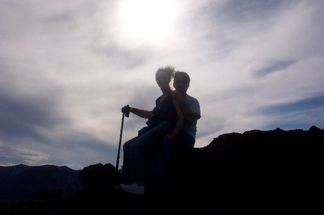 Marilyn and Sam Sitting on a Rock
