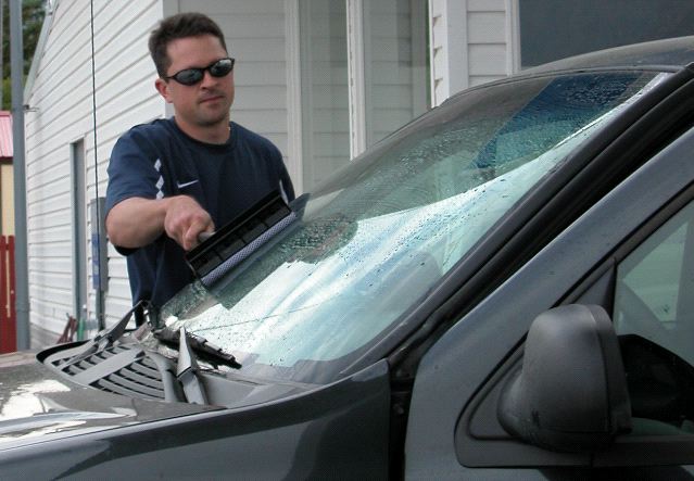 Chad Cleaning Window